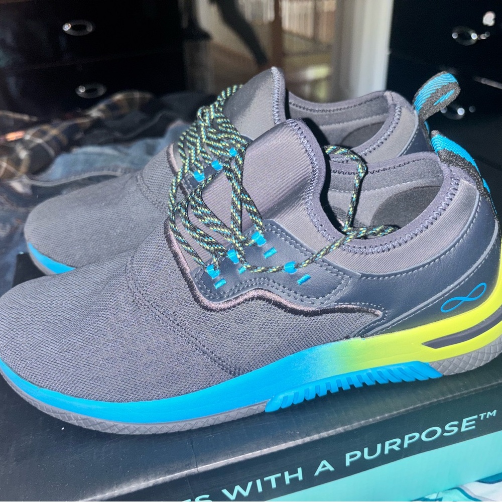 Stylish NFINITY Women's Gray Sneakers with Blue and Yellow Accents